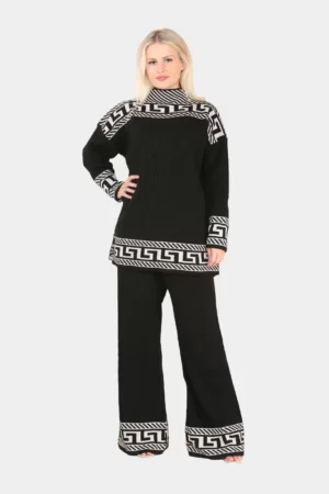 Woman posing in black colored Knitted Co 2 Piece Set in grey background