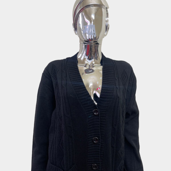 Women's matching button cardigan in navy blue color against grey background