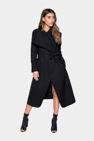 Women wearing black colored oversized belted waterfall drape coat in grey background